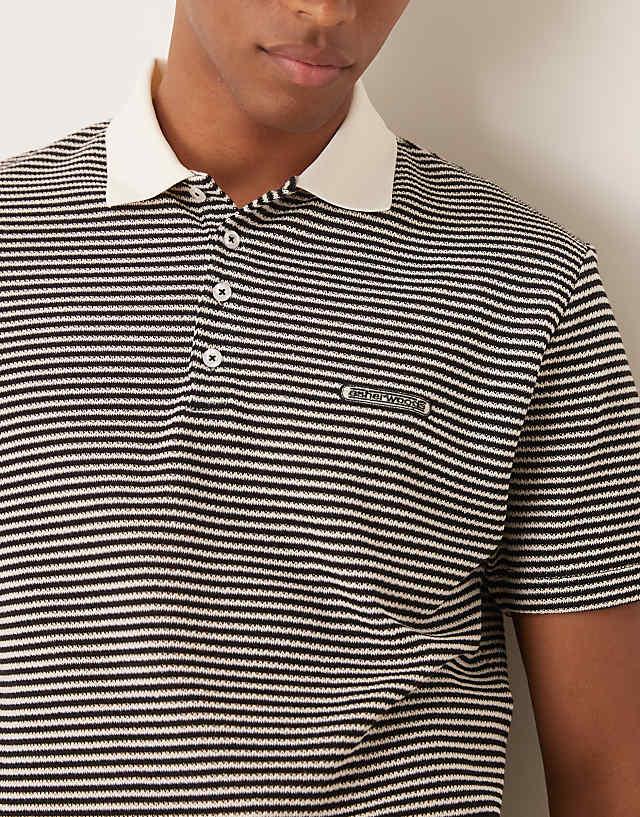 Asos ASOS DESIGN Boxy Relaxed Polo In Cream And Black Texture Stripe With Chest Embroidery