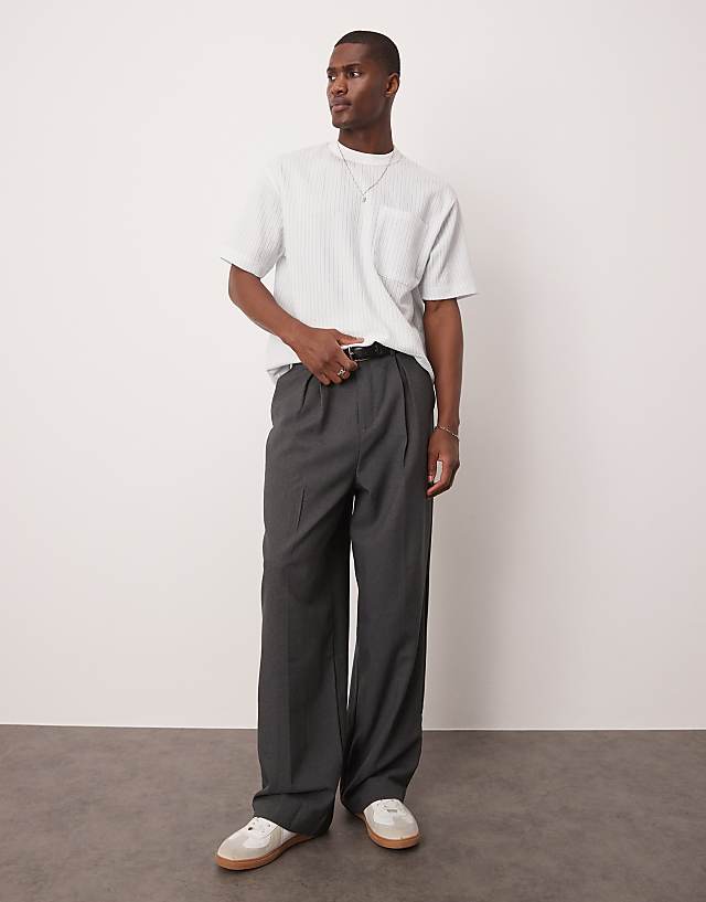 Asos ASOS DESIGN Boxy Relaxed T-shirt With Chest Pocket In Blue And White Textured Stripe