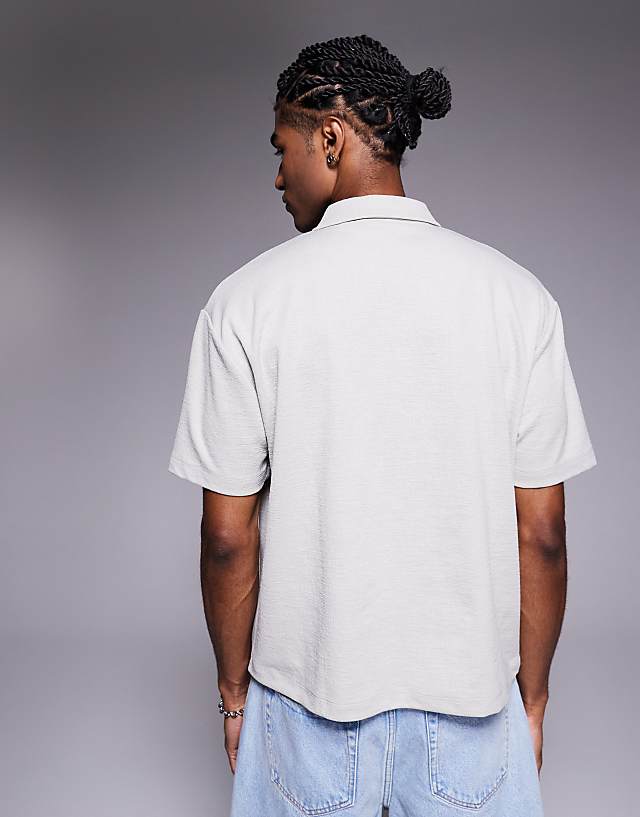Asos ASOS DESIGN Boxy Relaxed Zipped Polo In Grey Texture