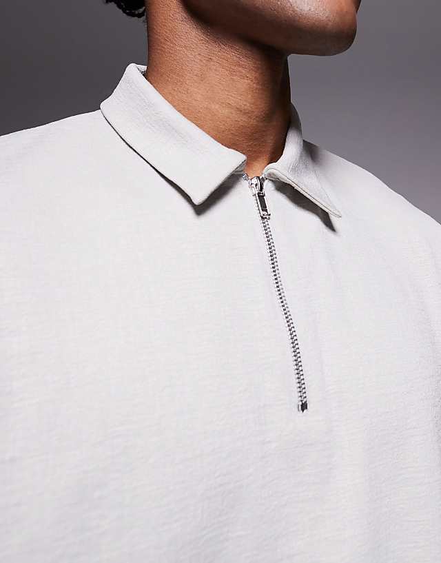 Asos ASOS DESIGN Boxy Relaxed Zipped Polo In Grey Texture