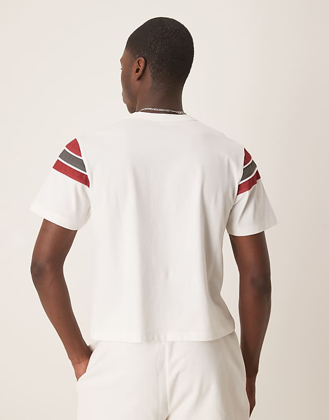Asos ASOS DESIGN Boxy T Shirt With Panelling And Sports Graphic In White