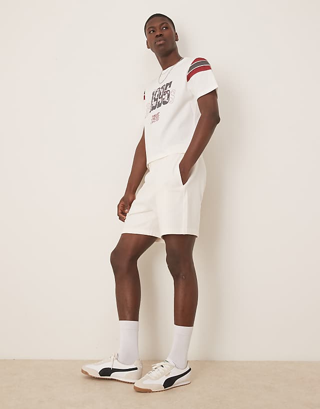 Asos ASOS DESIGN Boxy T Shirt With Panelling And Sports Graphic In White