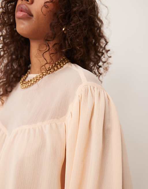 Asos ASOS DESIGN Bubble Hem Top With Sheer Yoke Detail In Peach