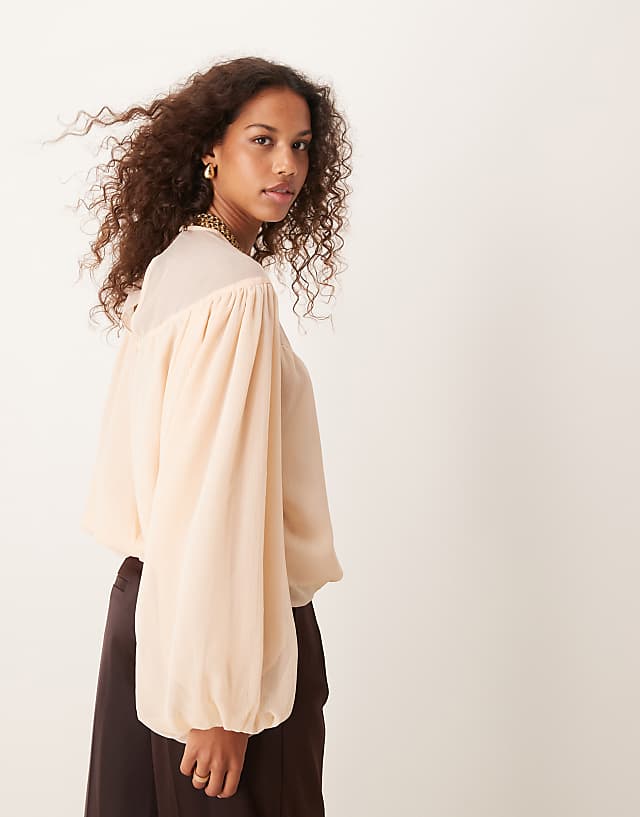 Asos ASOS DESIGN Bubble Hem Top With Sheer Yoke Detail In Peach