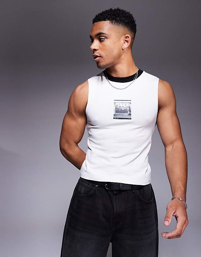 asos ASOS DESIGN cropped muscle fit tank with chest graphic in light grey