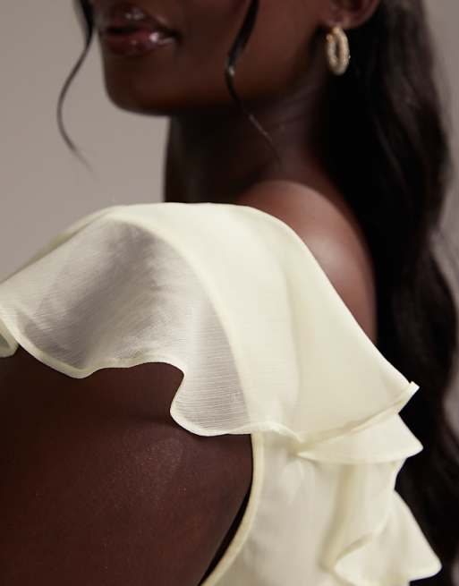 Asos ASOS DESIGN Curve Bridesmaids Flutter Sleeve Bias Maxi Dress With Godet Frill Hem In Soft Yellow