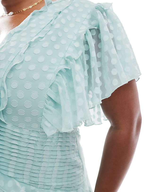 Asos ASOS DESIGN Curve Flutter Sleeve Burnout Spot Jacquard Midi Dress With Tie Front In Ice Blue