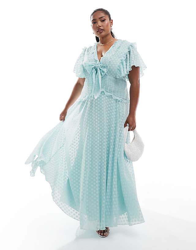 Asos ASOS DESIGN Curve Flutter Sleeve Burnout Spot Jacquard Midi Dress With Tie Front In Ice Blue