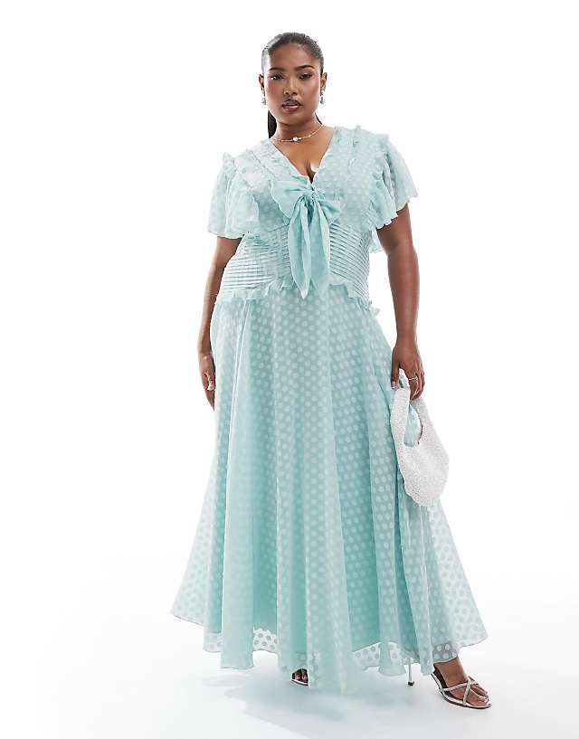 asos ASOS DESIGN Curve flutter sleeve burnout spot jacquard midi dress with tie front in ice blue