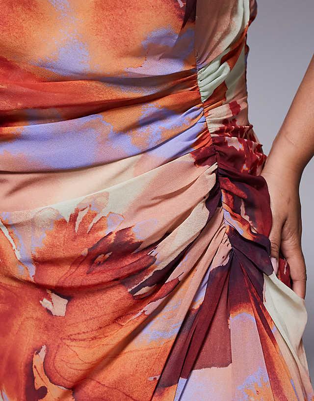 Asos ASOS DESIGN Curve Gathered Waist Ruffle Maxi Dress With Open Back In Abstract Print