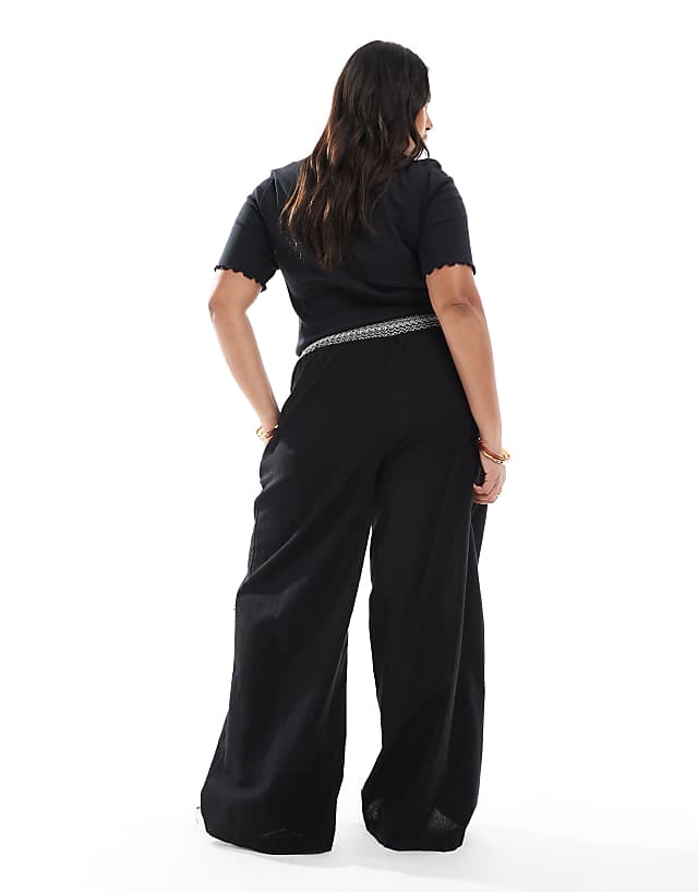 Asos ASOS DESIGN Curve Linen Blend Pull On Wide Leg Trousers With Shirred Waist Detail In Black With Cream