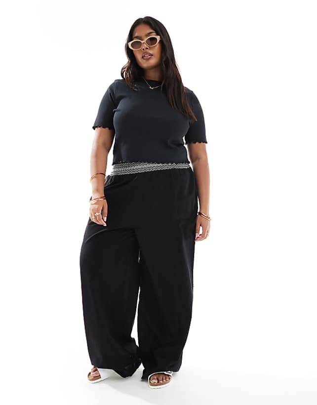 asos ASOS DESIGN Curve linen blend pull on wide leg trousers with shirred waist detail in black with cream