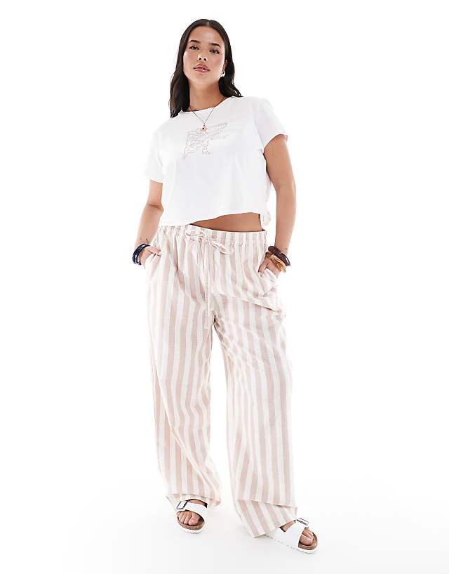 asos ASOS DESIGN Curve linen look pull on tapered trousers in mink stripe