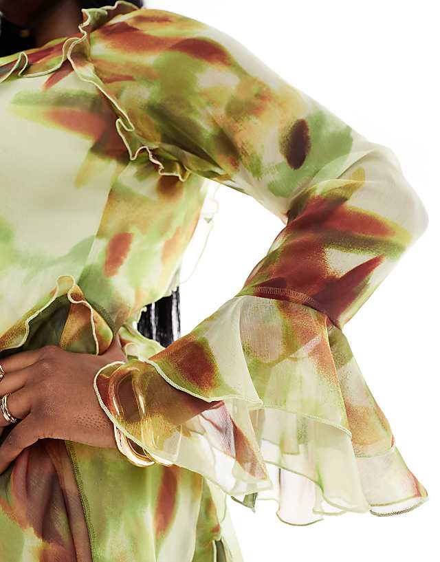 Asos ASOS DESIGN Curve Ruffle Tie Front Plunge Mini Dress With Frill Sleeves In Green Abstract Print