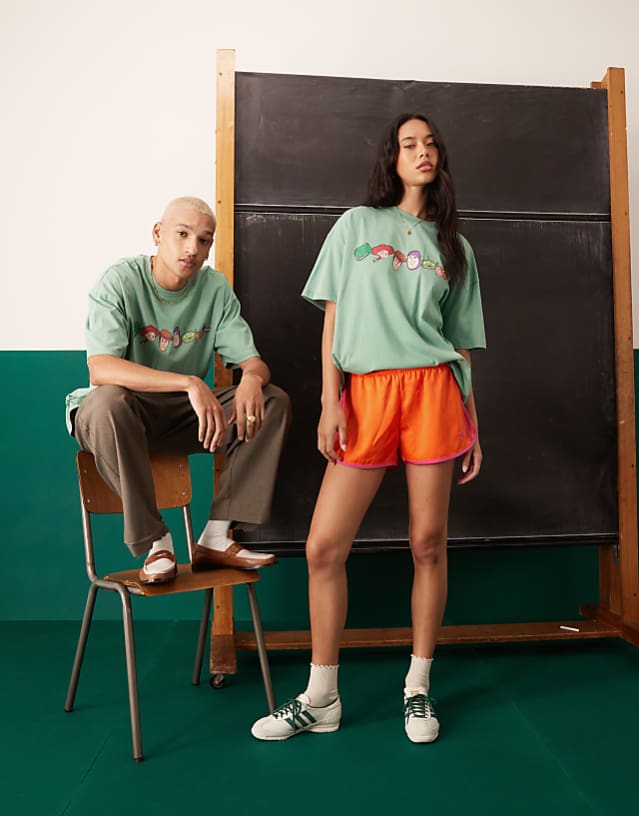 Asos ASOS DESIGN Disney Pixar Oversized T-shirt With Toy Story Prints In Washed Green