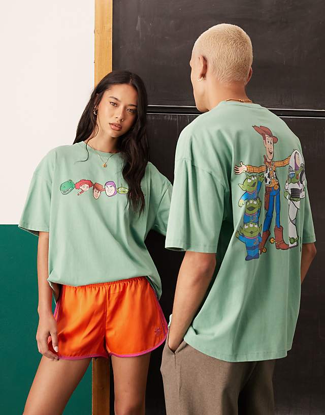 asos ASOS DESIGN Disney Pixar oversized t-shirt with Toy Story prints in washed green