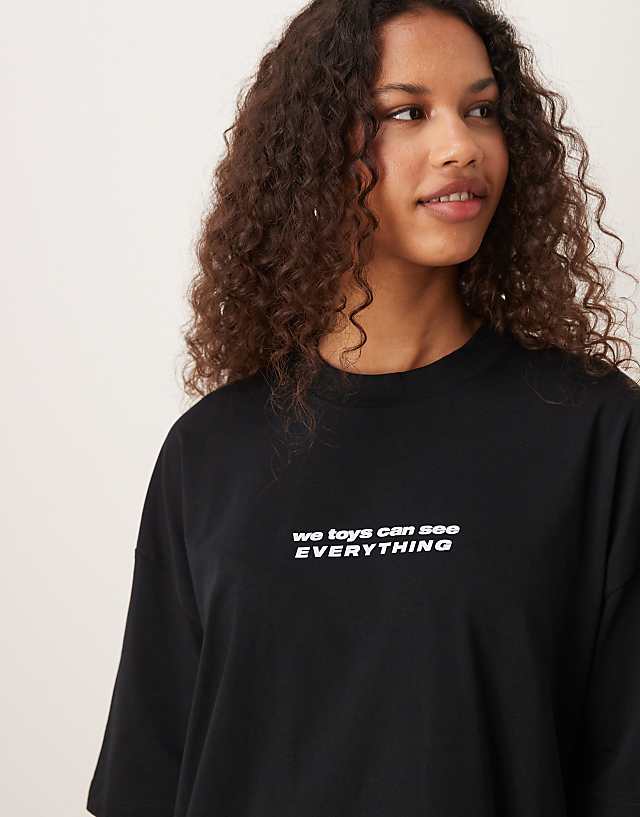 Asos ASOS DESIGN Disney Pixar Unisex Oversized T-shirt With Toy Story Sid Prints In Black