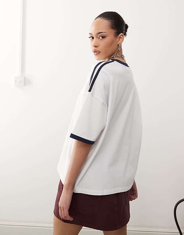 Asos ASOS DESIGN Disney Unisex Boxy Oversized Drop Shoulder T-shirt With Mickey Mouse Embroidery And Binding Detail In White