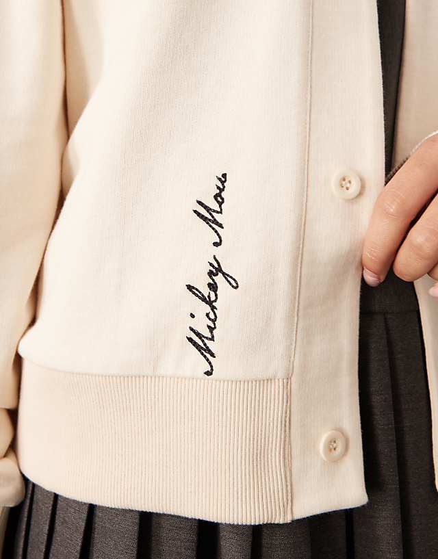 Asos ASOS DESIGN Disney Unisex Oversize Cream Cardigan With Mickey Mouse Embroidered Print