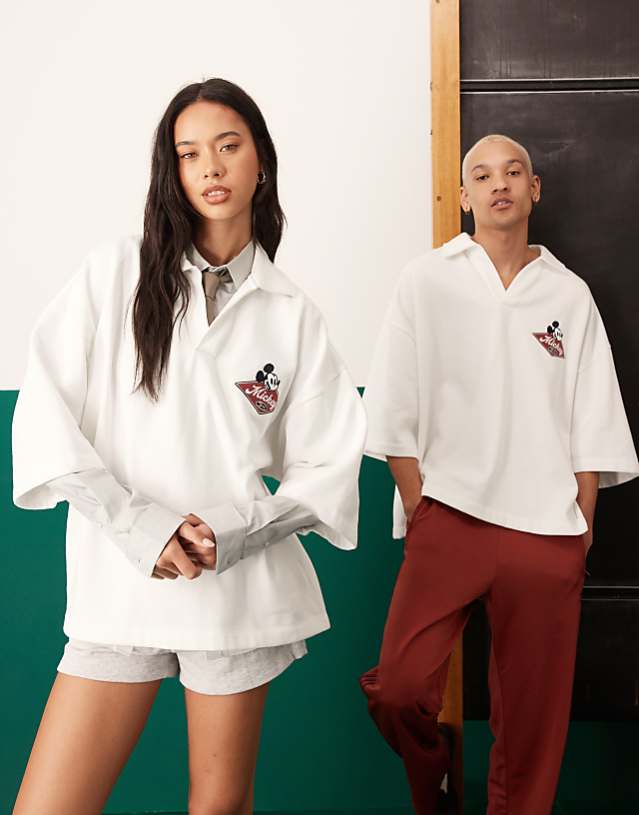 asos ASOS DESIGN Disney unisex oversize polo with embroidered Mickey Mouse print in off white