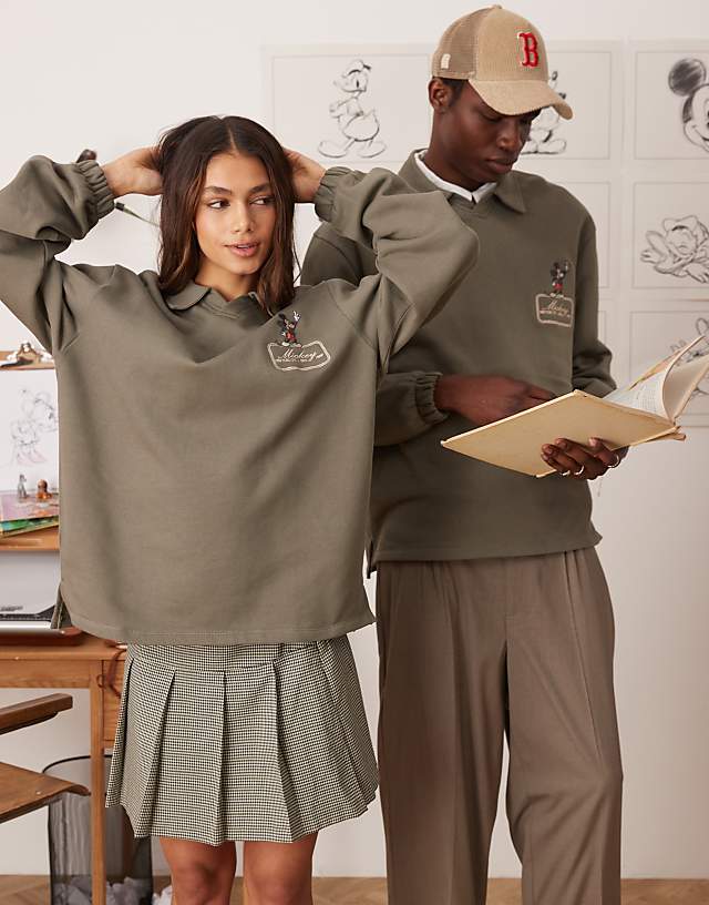 Asos ASOS DESIGN Disney Unisex Oversized Polo Sweatshirt With Mickey Mouse Prints In Khaki