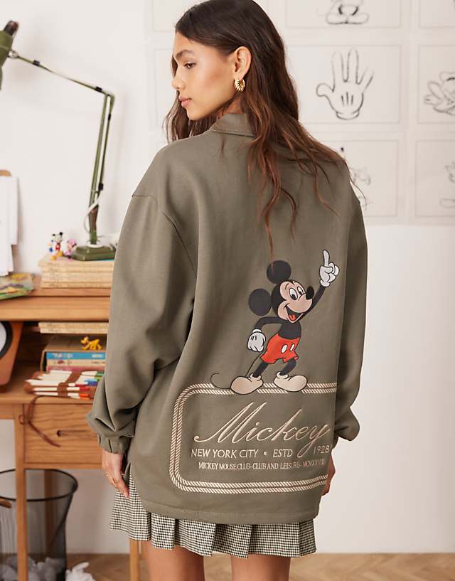 Asos ASOS DESIGN Disney Unisex Oversized Polo Sweatshirt With Mickey Mouse Prints In Khaki