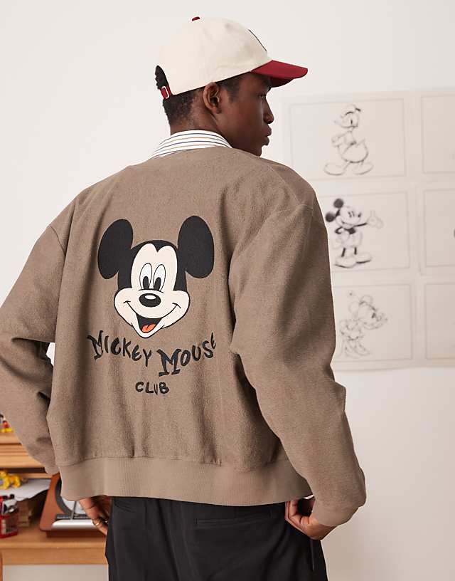 Asos ASOS DESIGN Disney Unisex Oversized Reverse Loopback Jersey Cardigan With Mickey Mouse Prints In Brown