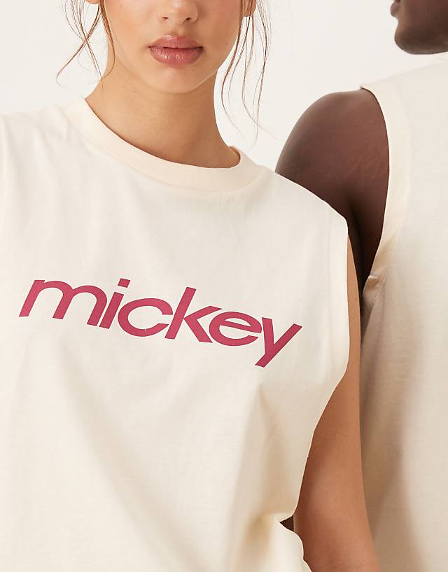 Asos ASOS DESIGN Disney Unisex Oversized Vest With Mickey Mouse Prints In Butter Yellow