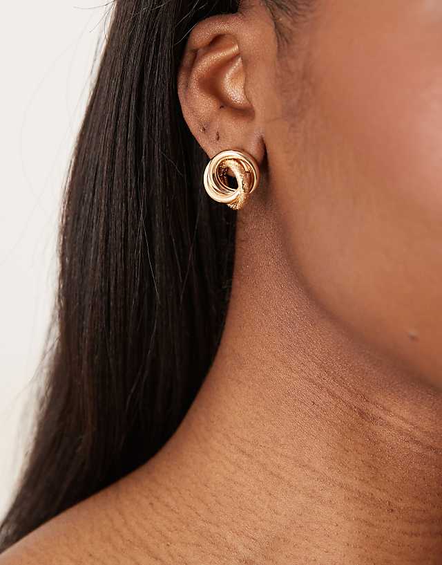 asos ASOS DESIGN earrings in knot design in gold tone