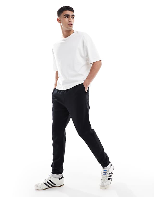 asos ASOS DESIGN essential skinny joggers in black - BLACK