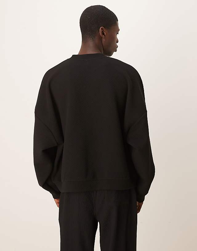 Asos ASOS DESIGN Extreme Oversize Boxy Sweatshirt With Heavy Rib Texture In Black