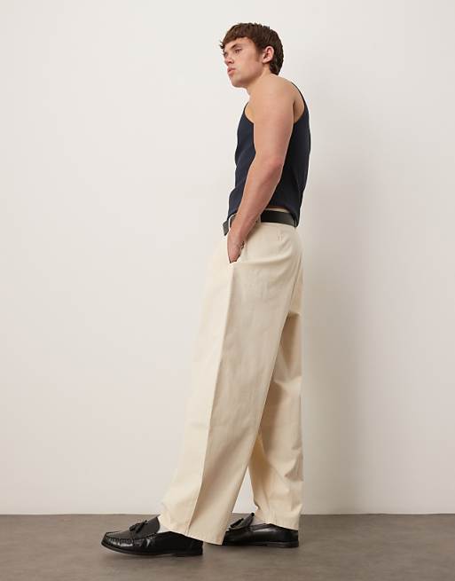 Asos ASOS DESIGN Extreme Tapered Trousers With Pleats In Beige