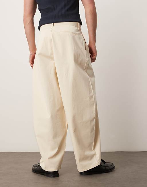 Asos ASOS DESIGN Extreme Tapered Trousers With Pleats In Beige
