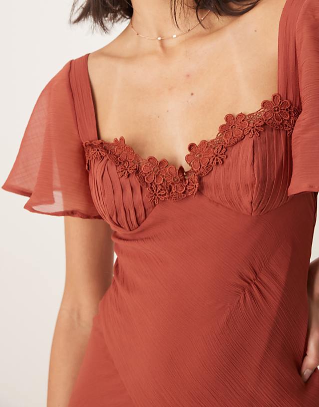 Asos ASOS DESIGN Flutter Sleeve Lace Trim Ruffle Split Midaxi Dress With Open Back In Rust