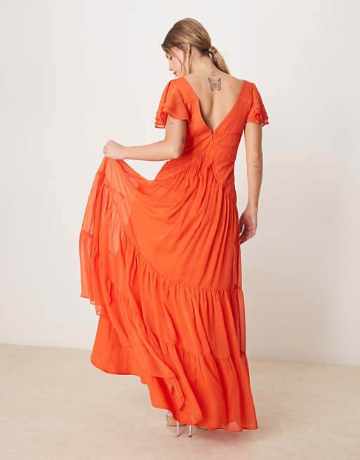 Asos ASOS DESIGN Flutter Sleeve Ruched Maxi Dress With Hi Low Hem In Spicy Red