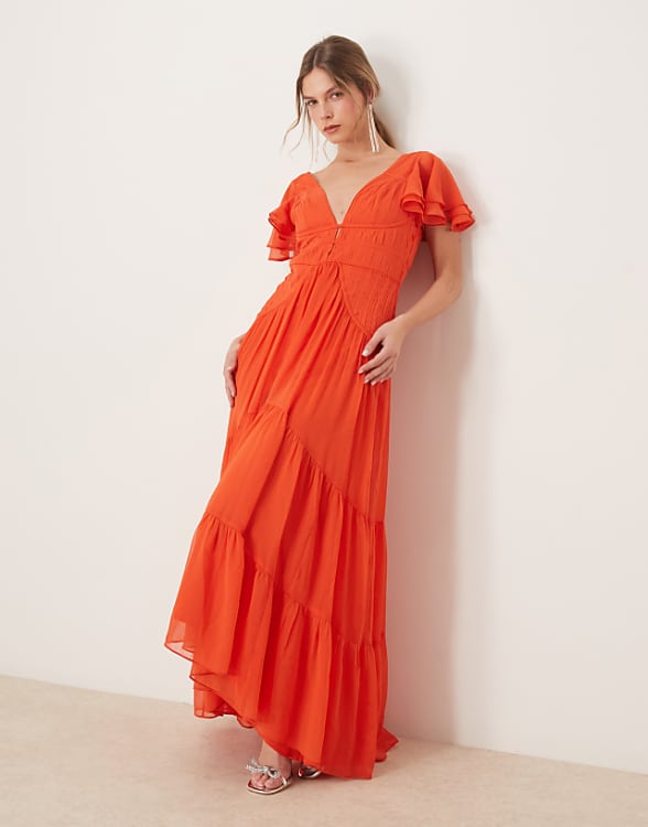 asos ASOS DESIGN flutter sleeve ruched maxi dress with hi low hem in spicy red