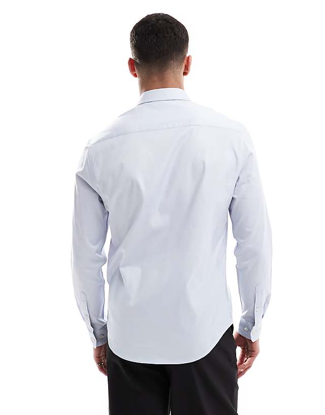 Asos ASOS DESIGN Formal Easy Iron Regular Shirt In Light Blue