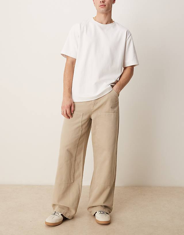 asos ASOS DESIGN garment dye super baggy carpenter jeans in beige