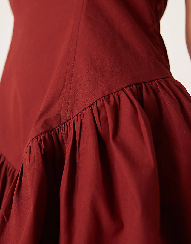 Asos ASOS DESIGN Halter Mini Dress With Ruffle Hem In Burgundy