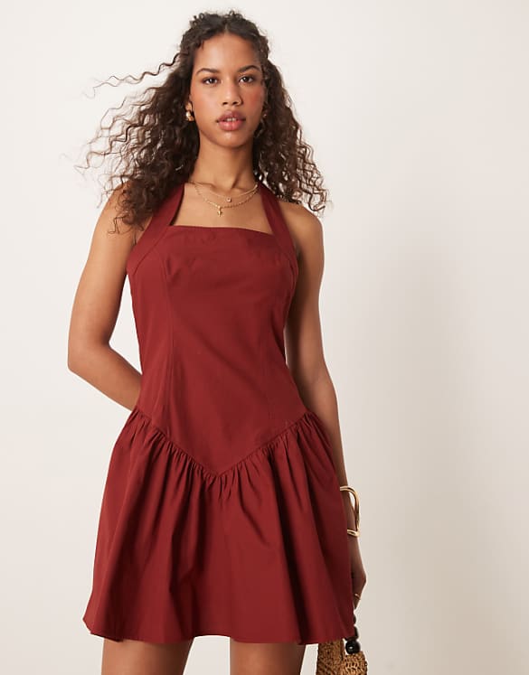 asos ASOS DESIGN halter mini dress with ruffle hem in burgundy