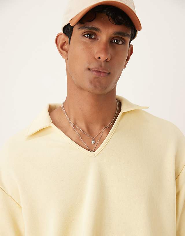 Asos ASOS DESIGN Heavyweight 300gsm Loopback Notch Neck Polo In Beige