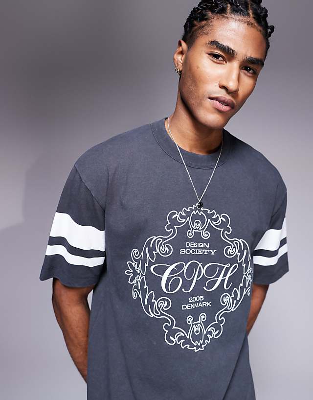 asos ASOS DESIGN heavyweight boxy relaxed t-shirt with text graphic and sleeve detail in washed charcoal