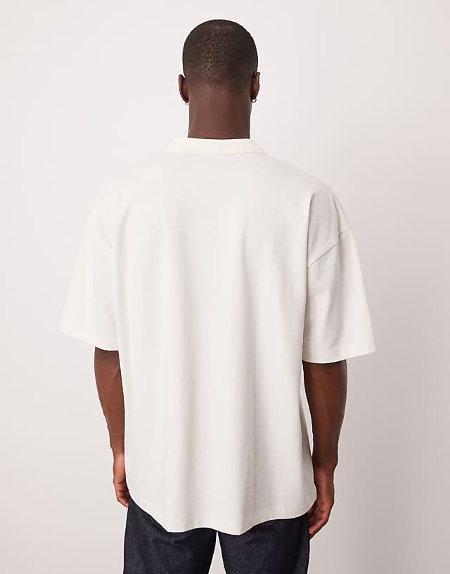 Asos ASOS DESIGN Heavyweight Polo With Print In Beige