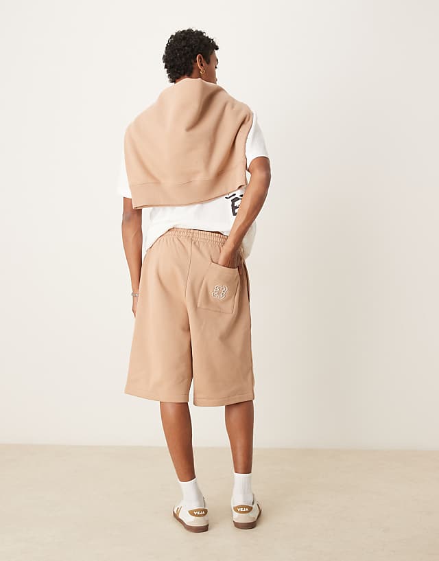 Asos ASOS DESIGN Heavyweight Short With Embroidery On Back Pocket In Beige - BEIGE