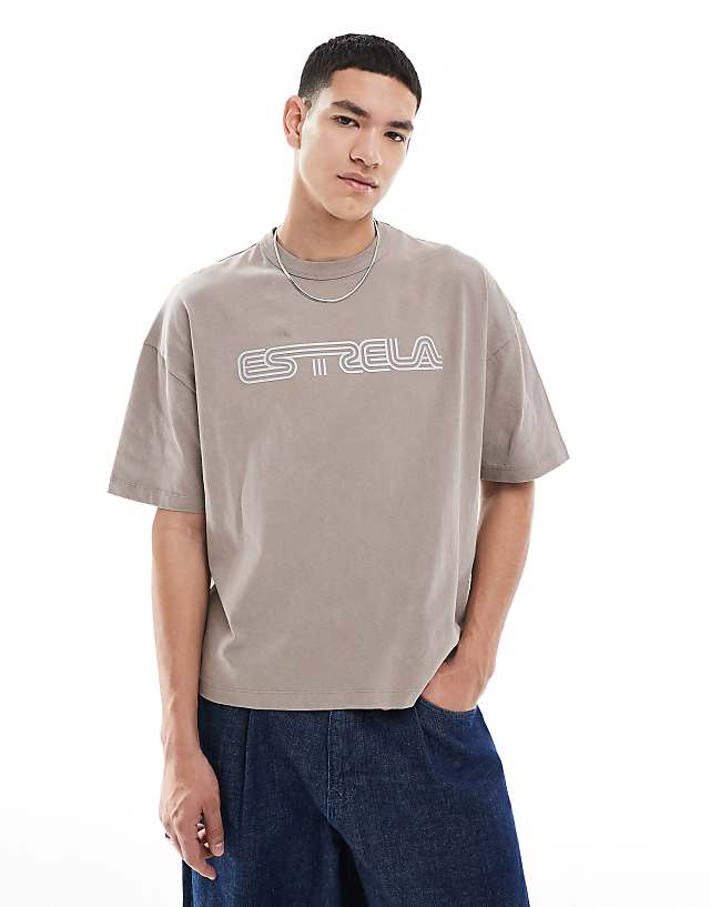 asos ASOS DESIGN heayweight boxy oversized t-shirt in washed stone with rubber text graphic