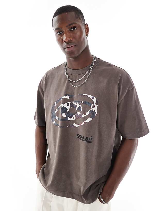 asos ASOS DESIGN heayweight boxy oversized t-shirt in washed brown with street graphic