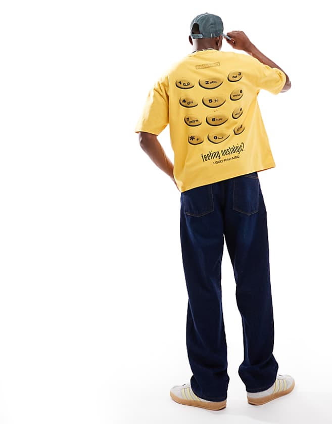 asos ASOS DESIGN heayweight boxy oversized t-shirt with nostalgic phone graphic in washed yellow