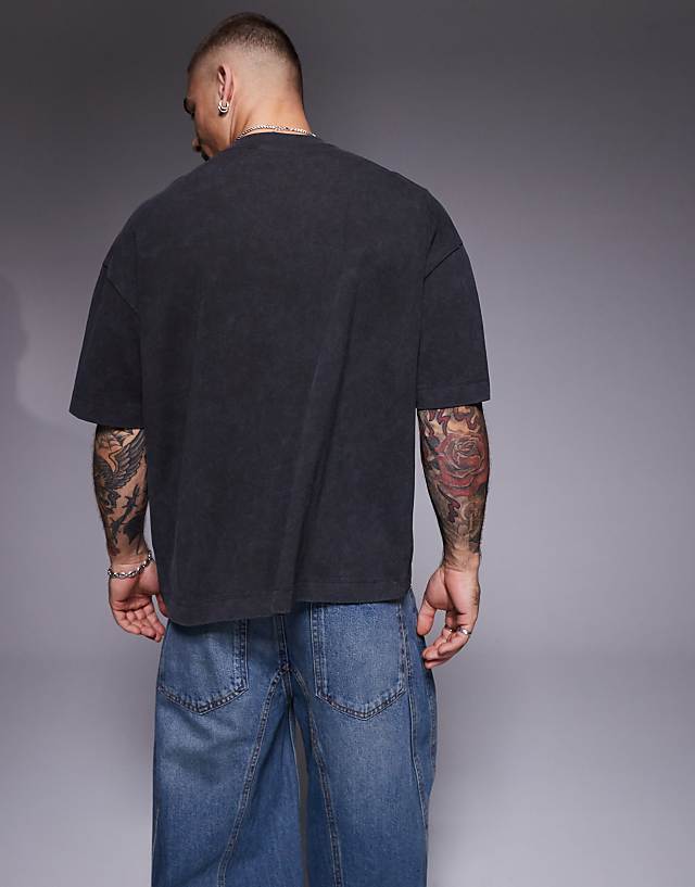 Asos ASOS DESIGN Heayweight Boxy Oversized T-shirt With Text Graphic And Pocket Detail In Washed Charcoal