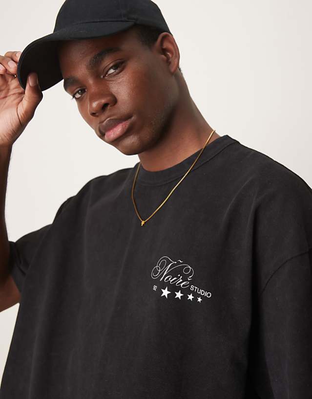 Asos ASOS DESIGN Heayweight Boxy Oversized T-shirt With Text Graphic In Washed Black