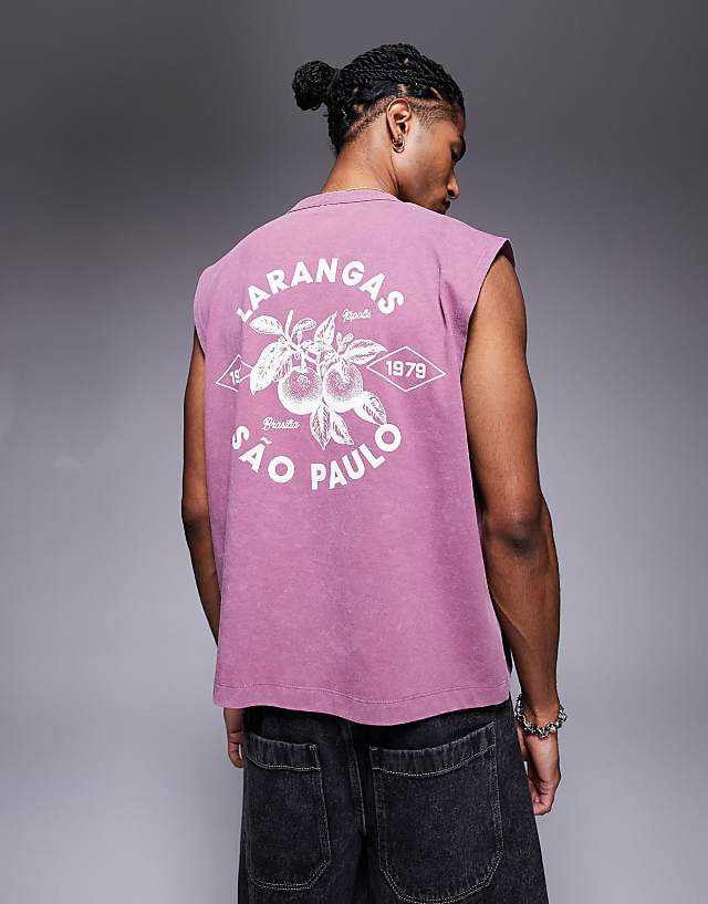 asos ASOS DESIGN heayweight boxy oversized tank in washed pink with city graphic